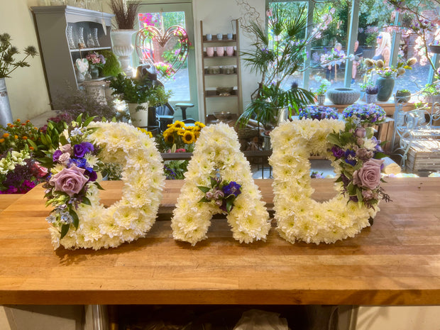 White Based Flower Letters With Colour Spray